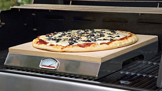 Grill-Top PizzaQue Stone lets you cook your pizza on the grill