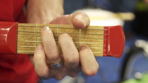 Would you use a practice guitar that fits in your pocket?