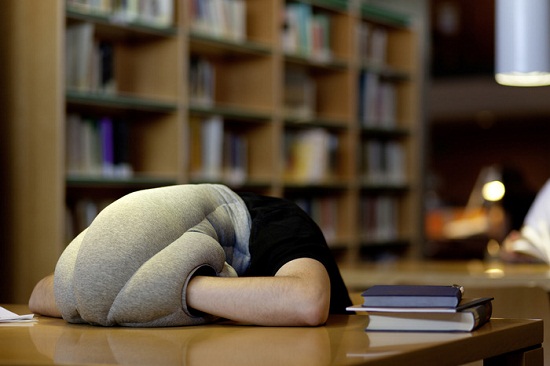 Ostrich Pillow lets you bury your head into a good nap