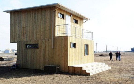 Container House – $60,000 home builds in four days with 3 workers, a crane, wrench and a drill