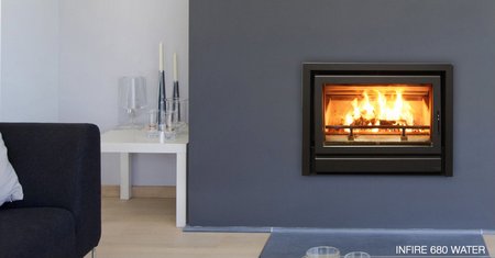 New energy saving woodstove captures and uses heat for water