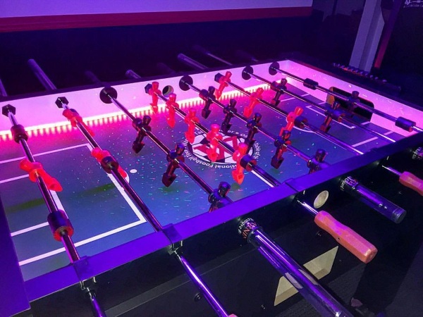 Warrior Professional Foosball Table – play foosball in the dark with this LED equipped table